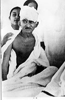 Gandhi breaking the fast, Rajkot, March 7, 1939