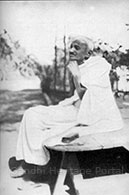 Gandhi shaving without a mirror, Sabarmati Ashram, 1921
