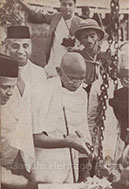 Gandhi performing the ceremony of laying the corner-stone of Kamala Nehru Memorial Hospital, Allahabad, November 19, 1939